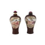 A pair of Chinese famille rose snuff bottles.