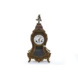 A 19th century French Boulle work and ormolu mounted clock, bombe form, white enamelled dial with
