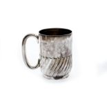 A late Victorian sterling silver tankard, London 1897, by William Hutton and Sons Ltd, of