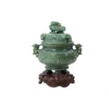 A Chinese green hardstone incense burner and cover.