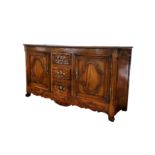 An 18th Century French provincial oak and fruitwood dresser base