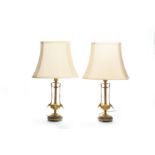 A pair of gilt and marble table lamps