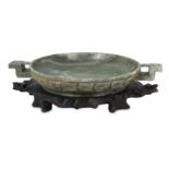 A Chinese green-grey jade offering dish.