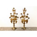 A pair of 19th Century French gilt metal candelabra the five sconces