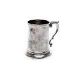A George III sterling silver tankard, London 1761, maker unkown, of cylincridcal slightly tapered