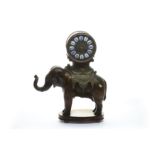 An early 20th century figurative bronze mantle clock