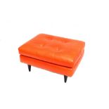 A contemporary orange leather upholstered footstool of rectangular outline