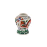 A Chinese wucai miniature dragon vase.