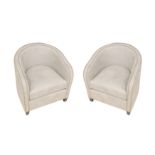 A pair of contemporary tub chairs