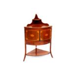 A George III Sheraton design mahogany corner cabinet