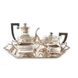 An Art Deco silver plate four piece tea set and tray