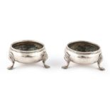 A pair of early George III Scottish sterling silver cauldron salts