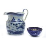 A 18th century Chinese willow pattern jug