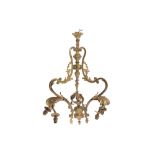 A 19th Century ormolu seven light chandelier in the rococo taste, the three S scroll frame with cast