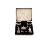 An Edwardian cased sterling silver cruet set