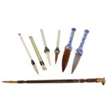 A collection of Chinese calligraphy brushes.