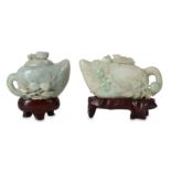 Two Chinese apple-green jadeite 'peach' teapots and covers.