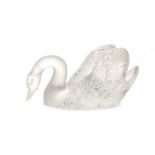A Lalique swan sculpture on mirrored base