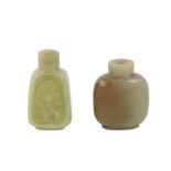 Two Chinese celadon jade snuff bottles.