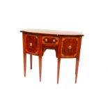 A George III Sheraton design mahogany bow fronted sideboard of small proportions