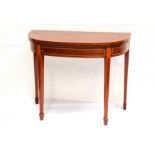 A Pair of George III style mahogany and satinwood inlaid demi lune card table