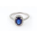 A sapphire and diamond ring