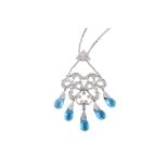 A blue topaz and diamond pendant necklace