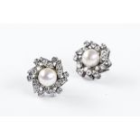 A pair of cultured pearl and diamond earrings