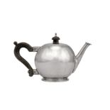 A George VI sterling silver hand crafted bullet teapot, London 1951 by Kennelm Armytage (1898-1968)