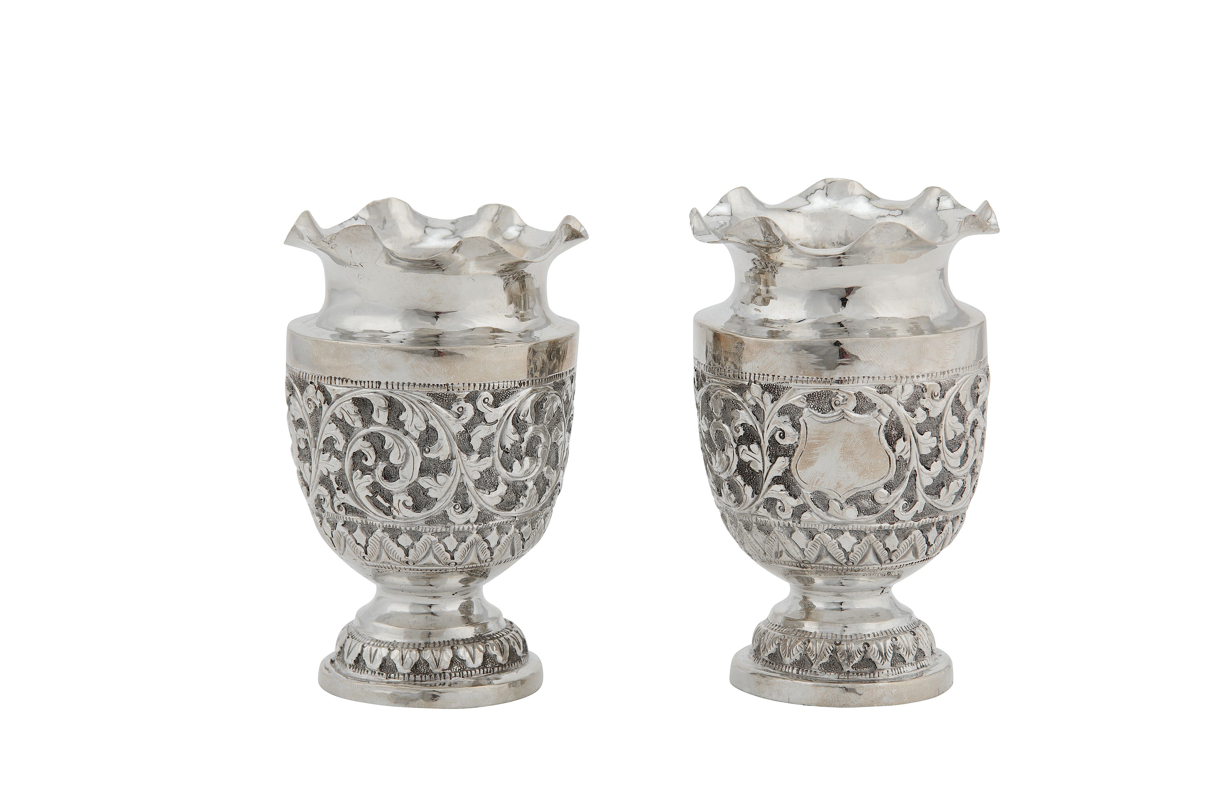 A pair of early 20th century Anglo – Indian Raj unmarked silver vases, Kutch circa 1900 - Image 2 of 2