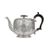 A Victorian sterling silver teapot, London 1897 by Goldsmiths & Silversmiths Co