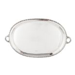 A George V sterling silver ‘arts and crafts’ twin handled tray, Birmingham 1923 by A. E. Jones