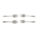 A set of four George II sterling silver shell back teaspoons, London circa 1755 by Richard Hawkins