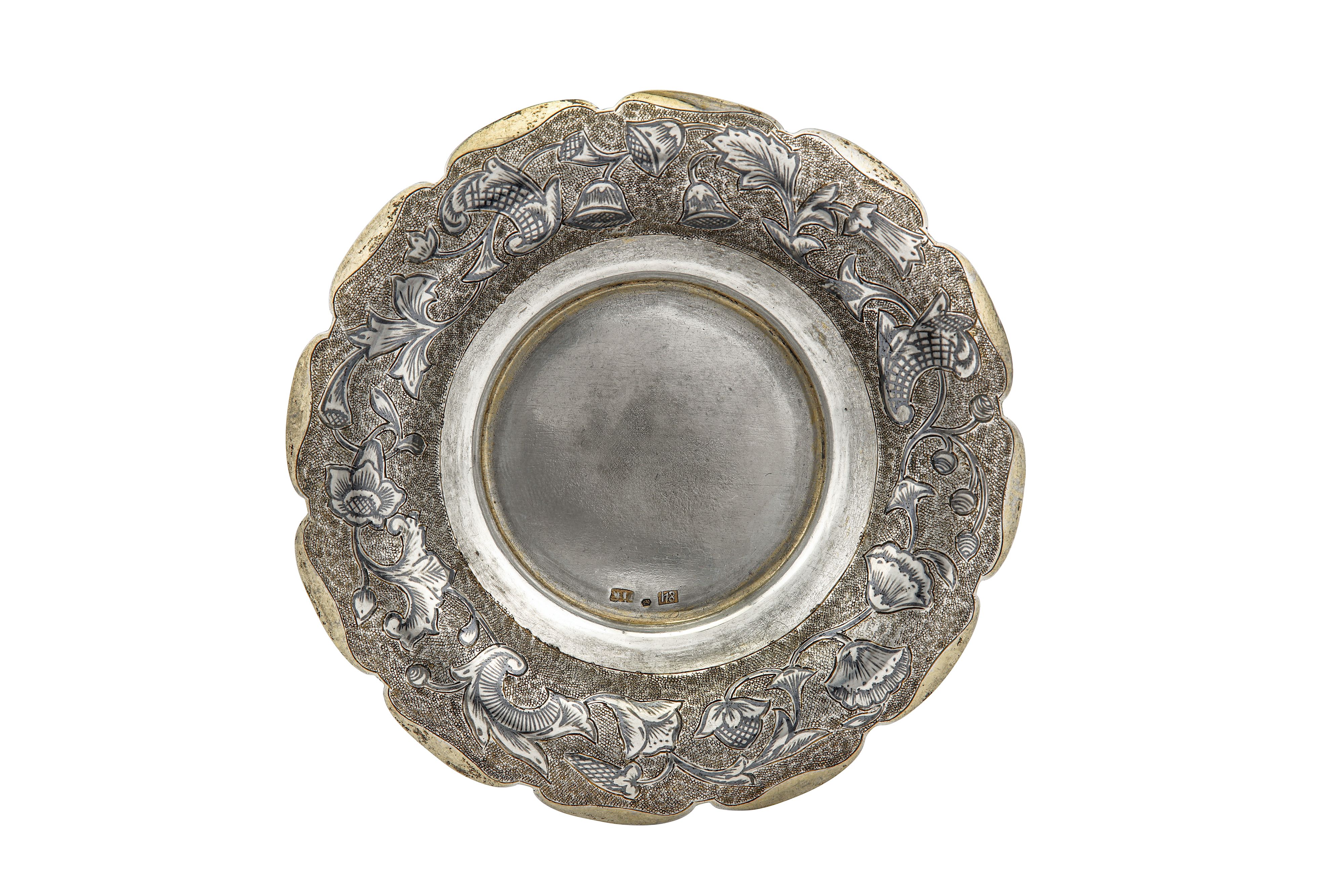 An Alexander II Russian provincial parcel gilt and niello 84 zolotnik (875 standard) silver saucer,