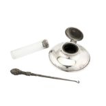 A George V sterling silver capstan inkwell, London 1922 by Charles Boyton & Son Ltd