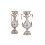 A pair of Edwardian sterling silver vases, Sheffield 1903 by Walker and Hall