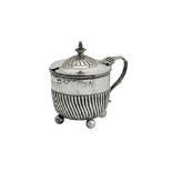 A Victorian sterling silver mustard pot, Birmingham 1882 by Horace Woodward & Co