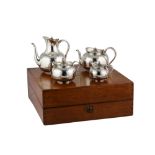 A cased Victorian sterling silver four-piece tea and coffee service, London 1874/75 by Martin Hall