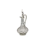 A Victorian sterling silver mounted glass claret jug, London 1849 by Charles Thomas Fox and George