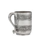 A Victorian sterling silver mug, London 1875 by Samuel Smith