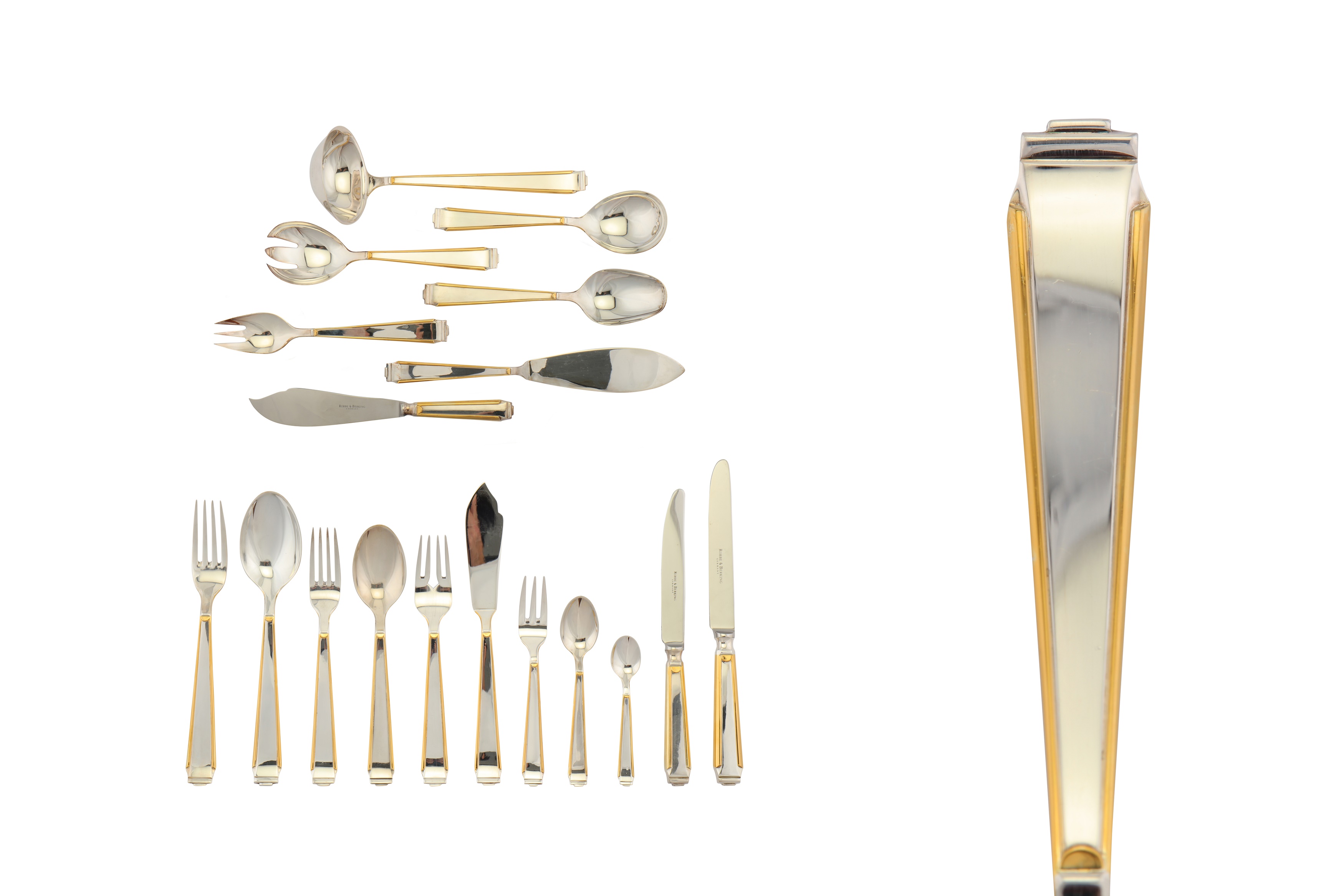 A modern German sterling silver parcel gilt table service of flatware / canteen, circa 1990 by