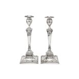 A pair of Edwardian sterling silver candlesticks, London 1901 by Sibray, Hall & Co