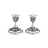 WITHDRAWN A pair of mid-20th century Iranian (Persian) unmarked silver dwarf candlesticks, Isfahan