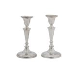 A pair of George V sterling silver desk candlesticks, Sheffield 1928 by Walker and Hall