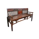 A Chinese carved wood bench