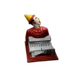 A early 20th century cast iron arcade 'Laughing Clown' rolling ball game