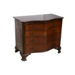 A late Victorian mahogany serpentine chest in the manner of Gillows