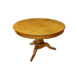 A satin birch Biedermeier style circular breakfast table