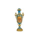 A French 19th Century bleu celeste Sevres style porcelain twin handled pedestal vase