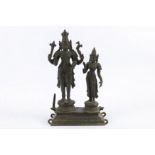 A CHOLA-REVIVAL BRONZE PROCESSIONAL STATUE OF SHIVA AND PARVATI